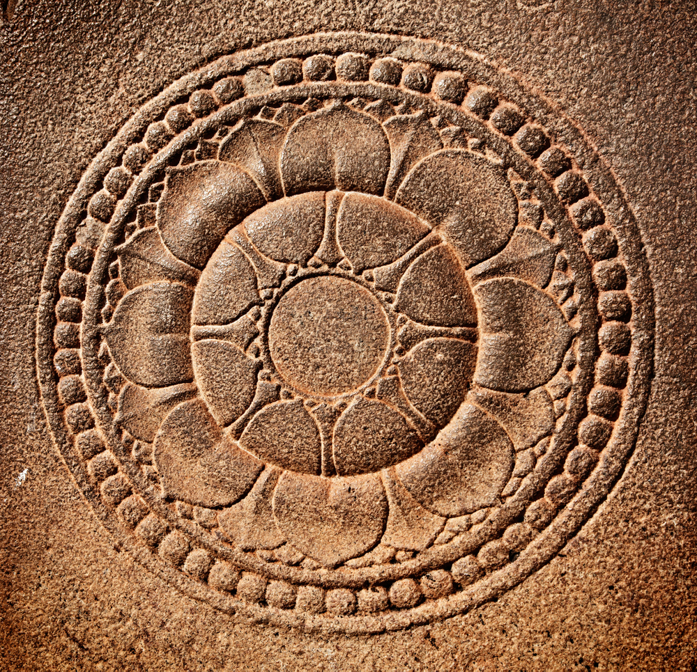 Stylized lotus carved on stone